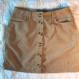 Faux suede button skirt.